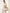 Damen-Handtasche aus Leder in Beige, als Business Bag an der Schulter getragen