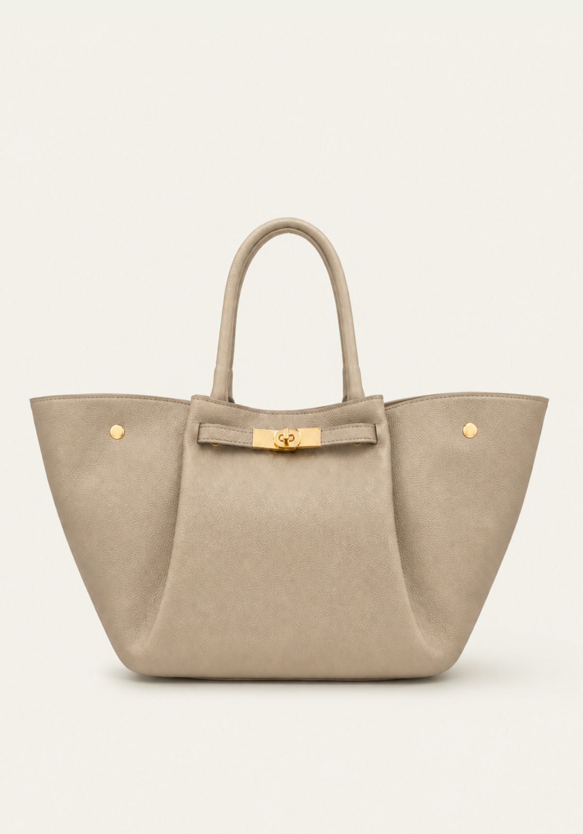 Damen-Handtasche aus Leder in Cremebeige, frontale Ansicht mit Tragegriffen und goldfarbenem Verschluss.