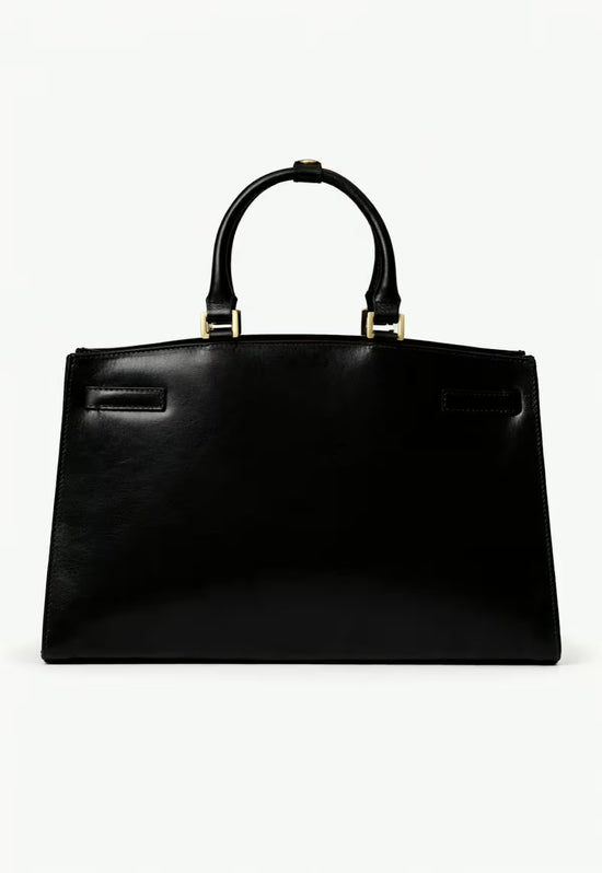 Schwarze Damen-Handtasche aus Leder in Rückansicht mit glatter Rückseite und Griffen