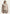 Damen-Lammfelljacke aus Sheepskin in Creme-Beige, von vorn am Modell getragen.