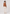 Lammfelljacke Tendre Cognac von hinten mit Merino-Besatz an Ärmeln und Saum